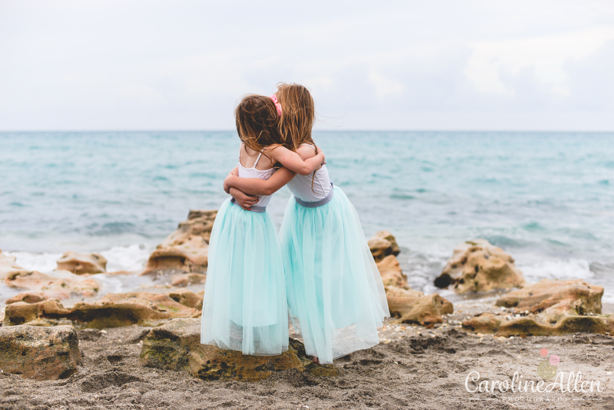 sister, love, hugs, rocks, beach