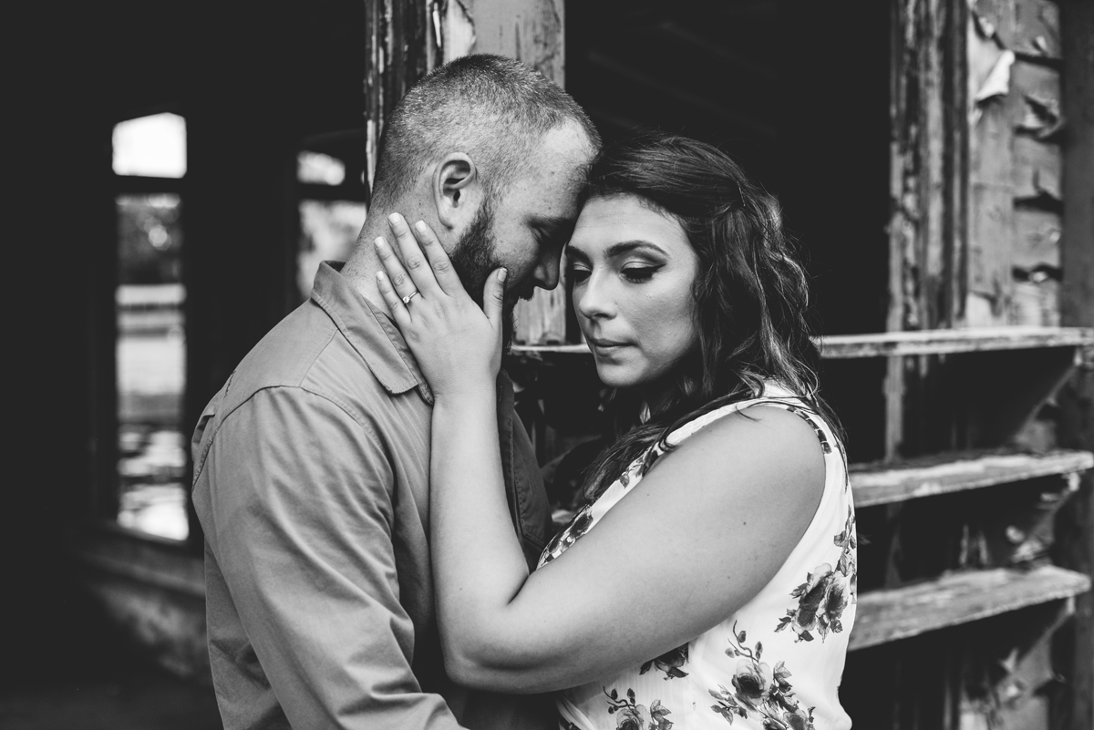 black and white, couple, boat house, lake, serious 