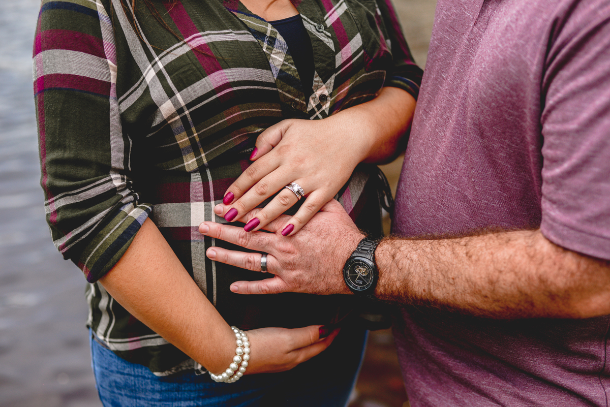 baby bump, hands, rings, flannel, river