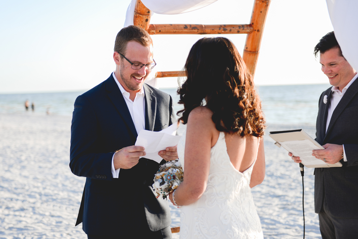 beach, wedding, groom, vows, ocean, paper