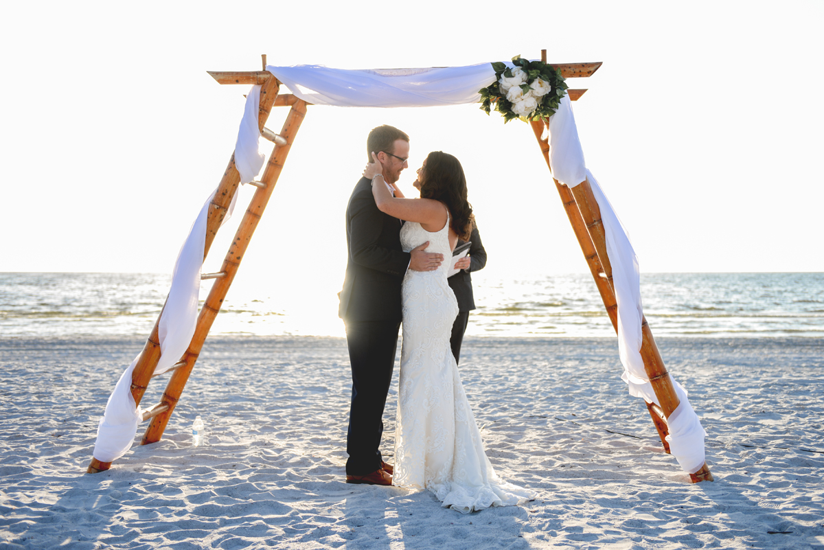 beach, wedding, bride, groom, i do, first kiss