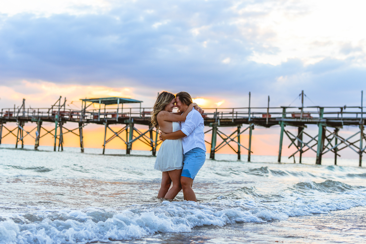 pier, ocean, sunset, waves, water, hugging