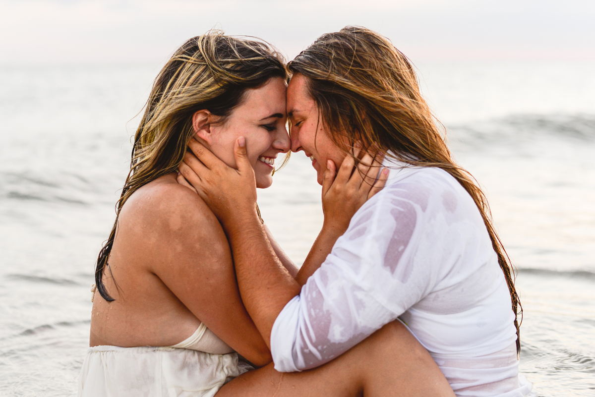 foreheads, ocean, waves, sea, holding hands