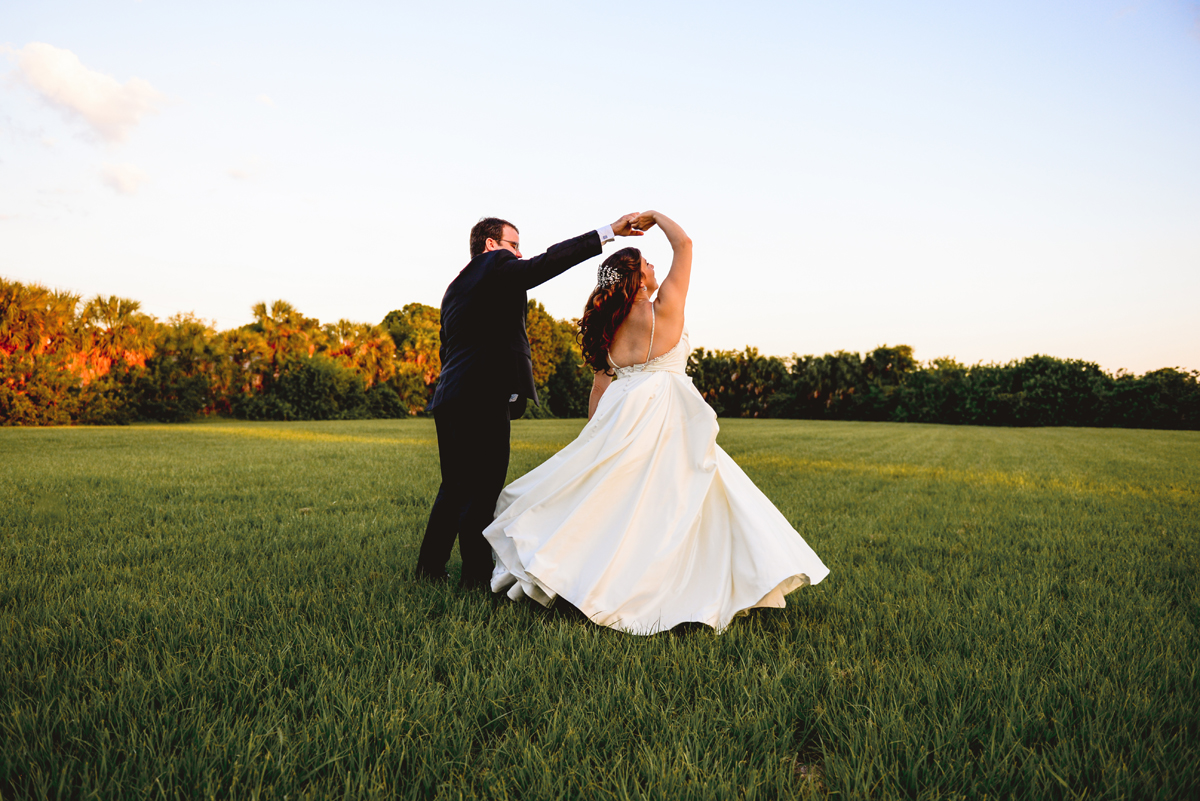dancing, field, bride, groom, sunset, grass