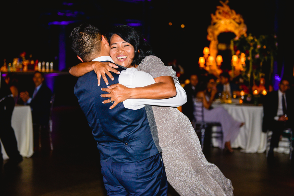 mother, son, dancing, wedding, hugging