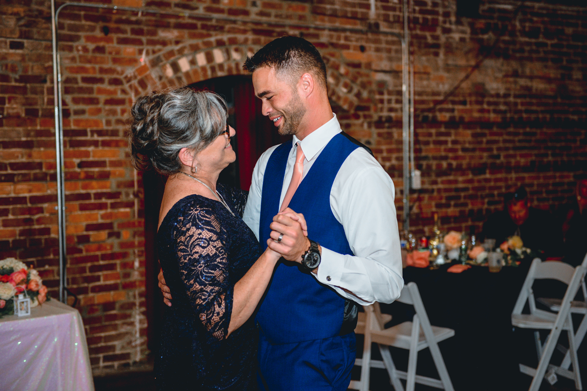 groom, mom, dancing, holding hands