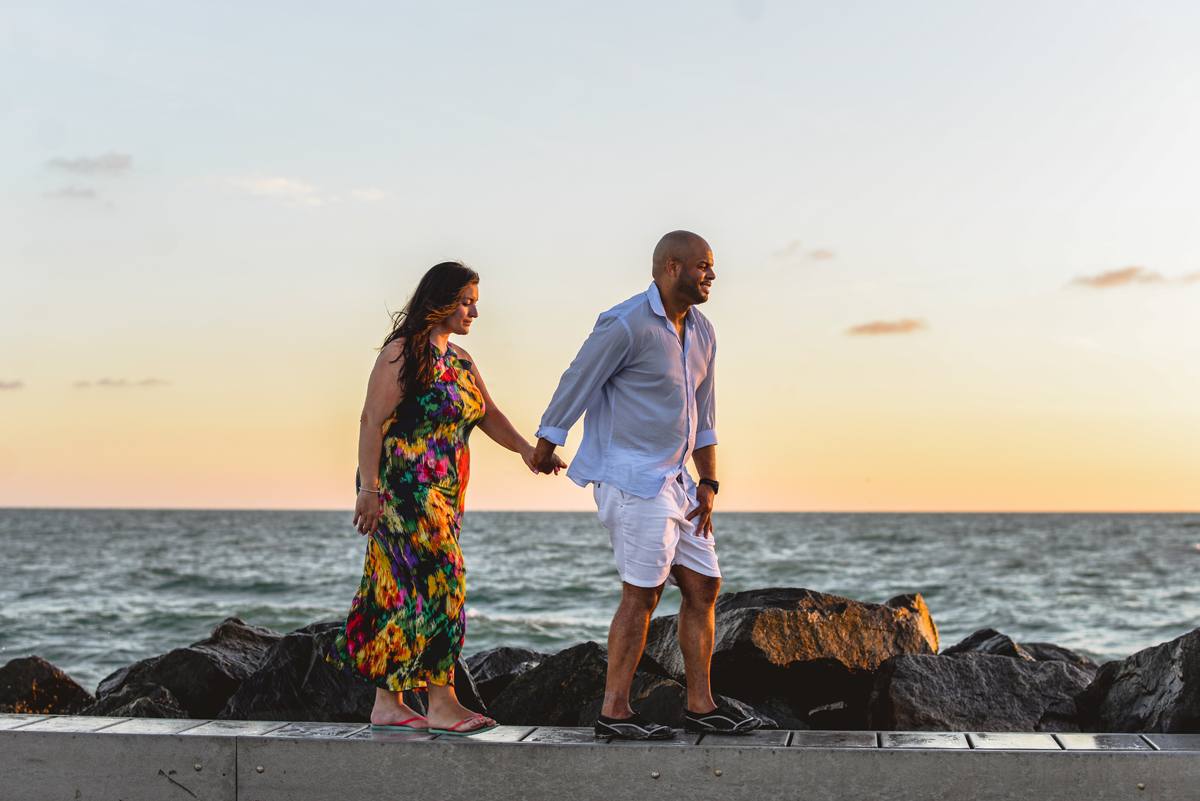 walking, holding hands, ocean, sunset, bridge