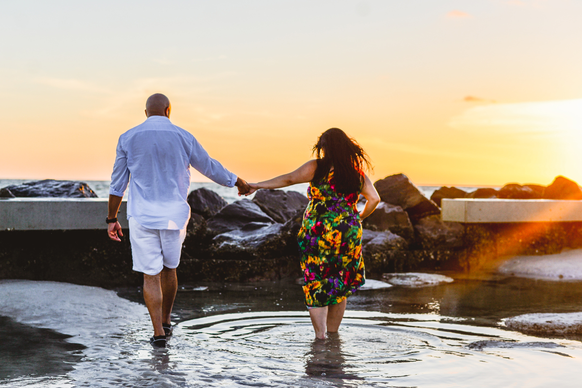 water, sea, pool, sun flare, holding hands