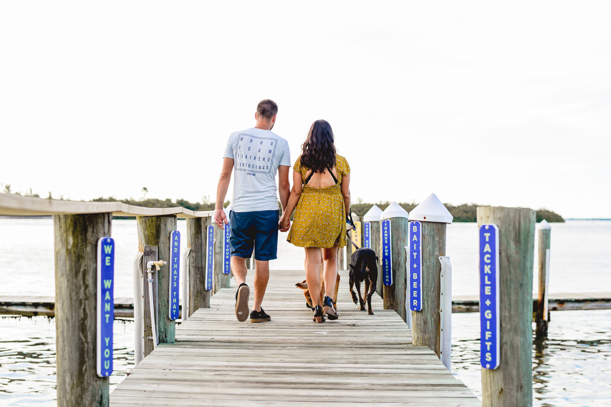 holding hands, walking, dogs, dock, water