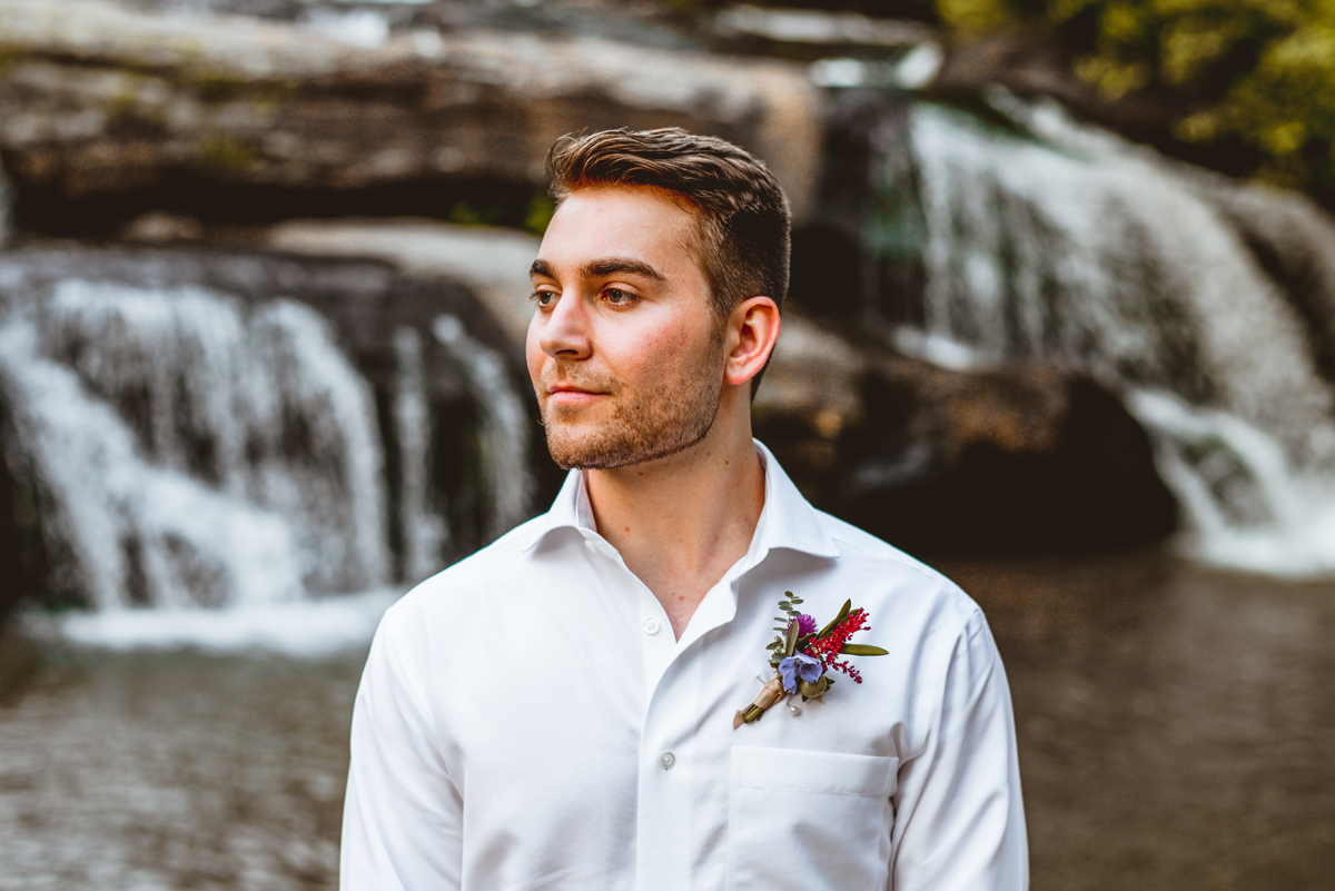 groom, portrait, boutonniere, waterfall 